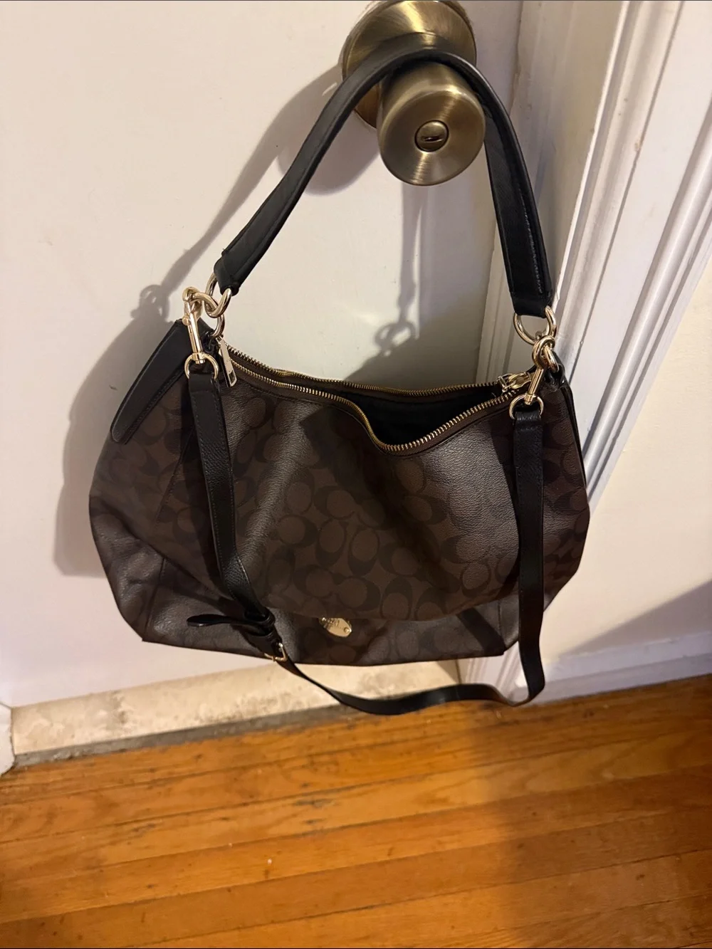 Coach Brown Signature Canvas Shoulder Bag with Black Straps and Gold Hardware